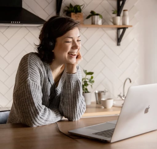 Woman on video call in her kitchen